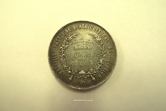 Townsville Pastoral and Agricultural Association Medal, Awarded to W Rowe for Photographs , August 1889