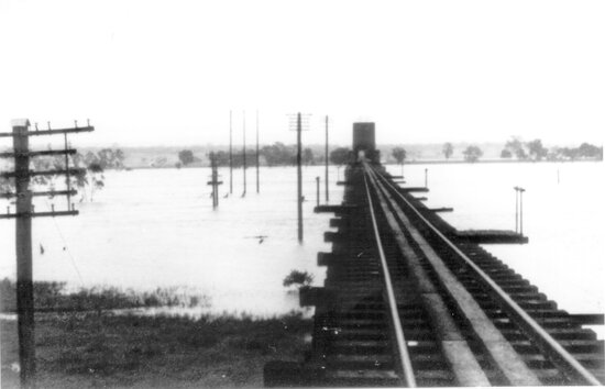 Burdekin River in Flood at Macrossan Rail Bridge - View along tracks