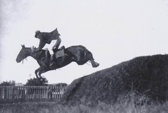 Jim Tolano competing in Show Jumping at the Charters Towers Showgrounds, 1925