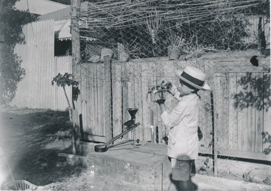 Horace Meredith Wooster playing with Meccano Set