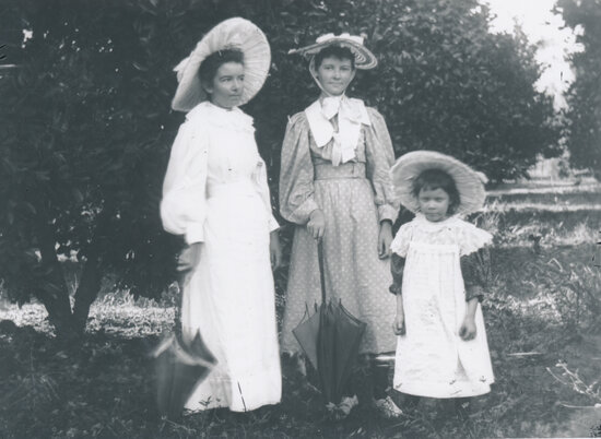 Two Unknown women with child