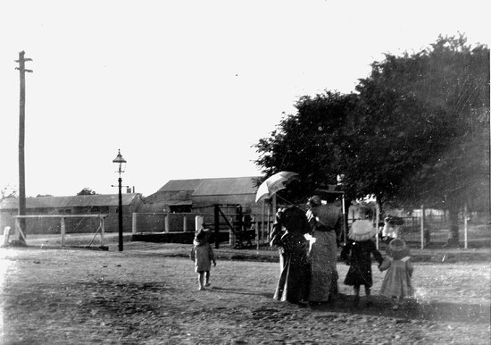 Group of Women and Children in Street possibly near Lissner Park?