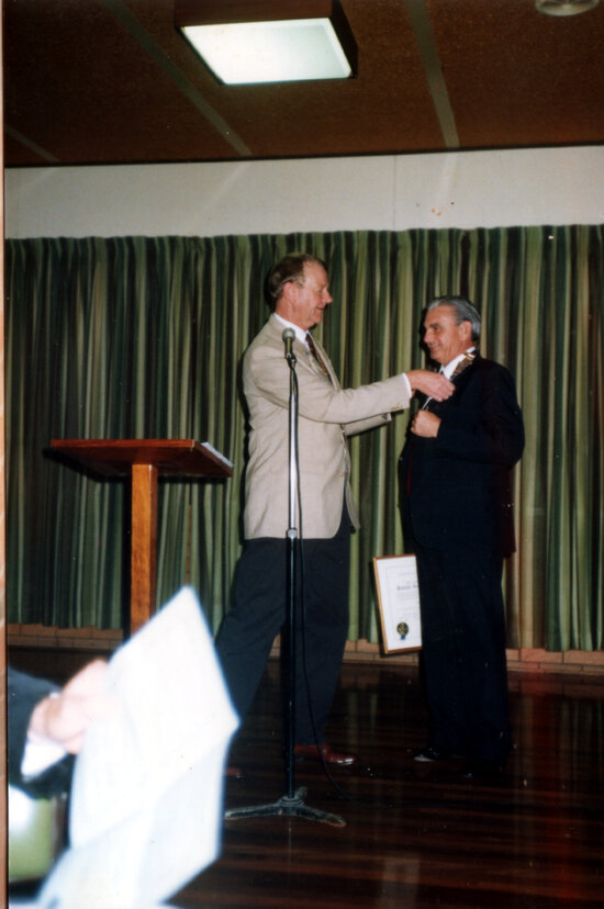 Ken Sellars being presented with Paul Harris Award, Rotary