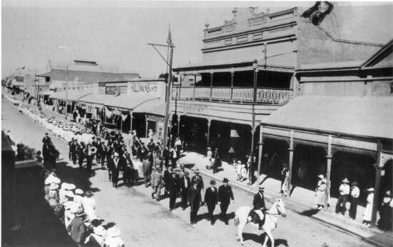 Anzac Day Procession Marching West Past H Aitcheson the Chemist in Gill Street