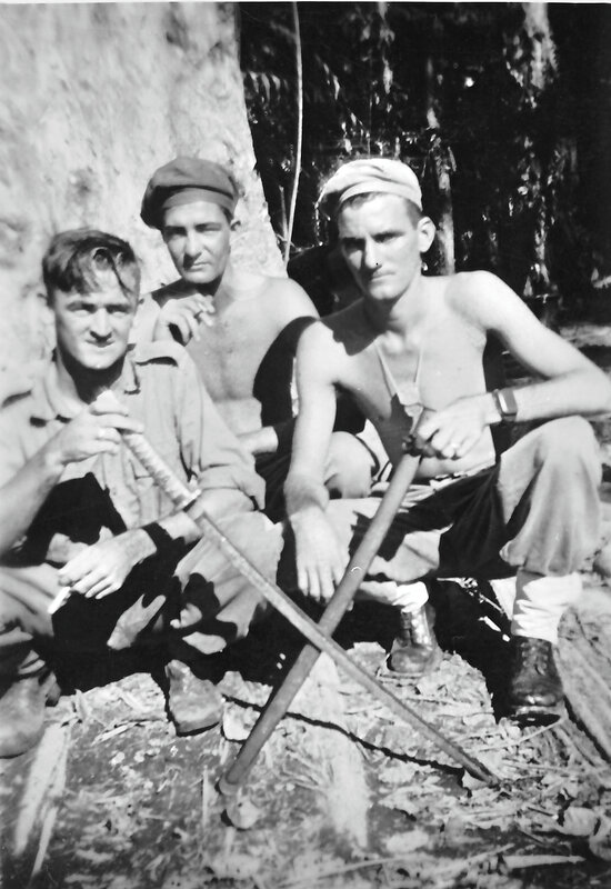 James Edward Rollinson&rsquo;s 2nd Son Ronald Rollinson with two other young men holding crossed swords