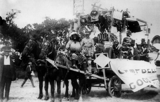 Black-face Musicians on horse drawn Procession float