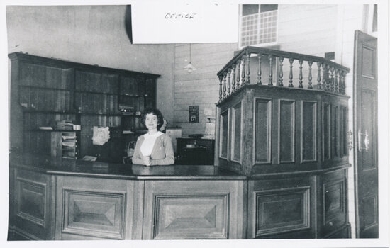 E D Miles &amp; Co Mining Exchange Office, 65 Mosman Street- interior counter area and staff member