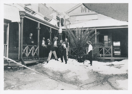 E D Miles &amp; Co Mining Exchange Office, 65 Mosman Street - Men shovelling ice in courtyard after hail storm