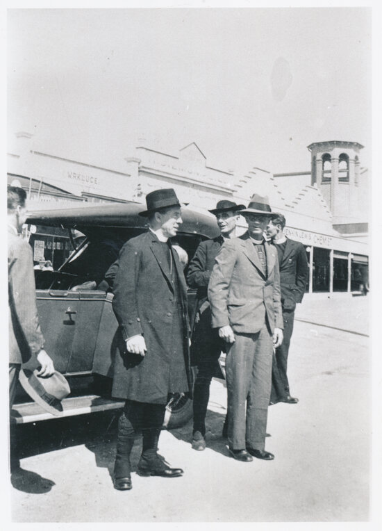 Clerical men/clergymen in Gill Street near Town Hall (Daking Smith building, Siemon&rsquo;s &amp; Jenkin Lewis chemist in background)