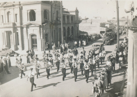 Charters Towers Band in procession, Gill Street 1947