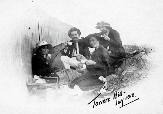 Daniel McCallum and three women drinking tea on Towers Hill, July 1915