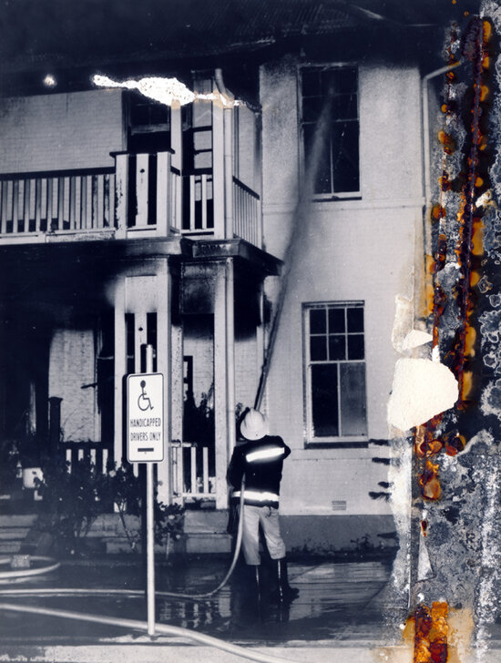 Fireman fighting fire at Police Station, Gill Street, 1988