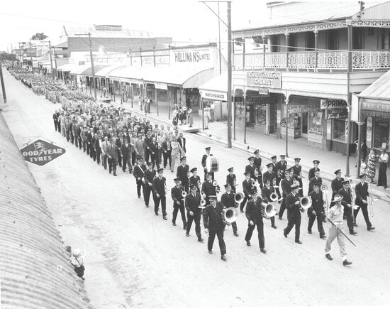 Excelsior Band and Veterans in ANZAC Day march, Gill Street, 1956