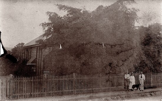 Family with Dogs outside their House, possibly 30 Towers Street