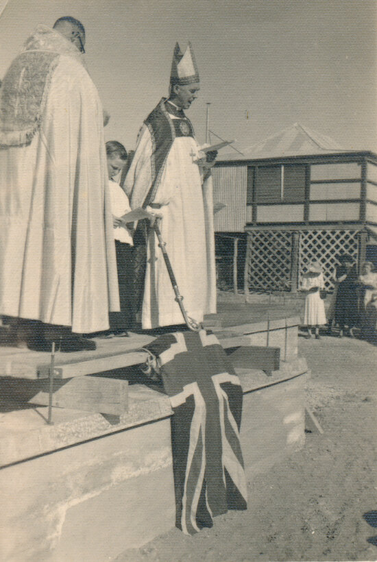 Priest Consecrating a Building