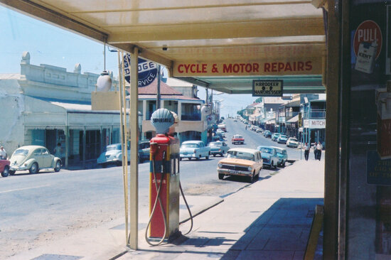 Petrol bowser outside Charters Towers Cycle and Motor Works, Gill Street, 1965