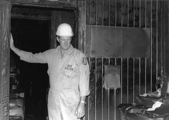Police Sergeant Brian Beveridge at Police Station Following Fire in May 1988