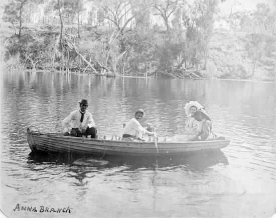 Fred Staubwasser (centre) and party boating on the Anabranch