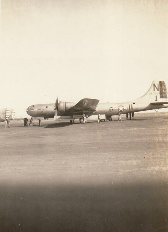 Bomber Aircraft on tarmac with personnel