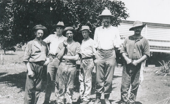 Group of men in working clothes
