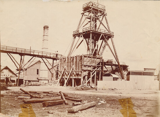 Poppet Head Frame and Chimney at unknown mine