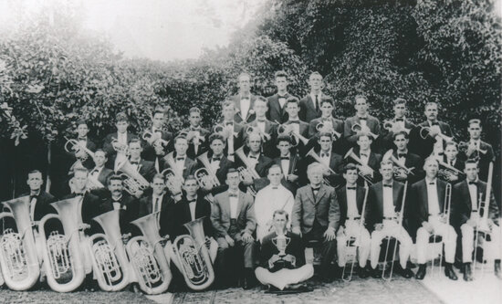 Band holding brass instruments