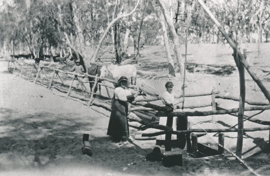 Jack Pryor and Nellie Pryor with sand well