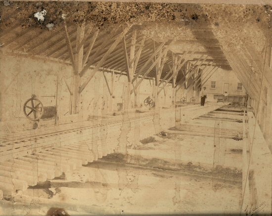 Brilliant and St George Mill showing cyanide vats with John Matthews standing rear center