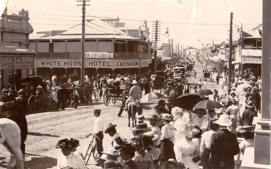 Large crowd just before intersection of Gill &amp; Deane, looking east