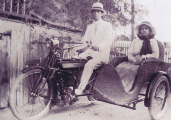 George Hosking and Beatrice Siemon on motorcycle and sidecar