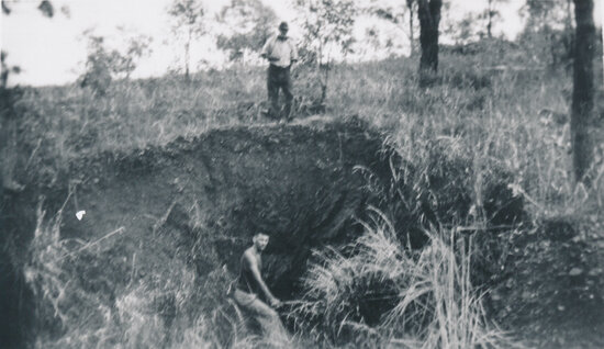 Two men at entrance to 110ft tunnel, Upper Cape