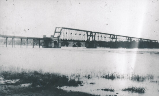 Macrossan Rail Bridge during flood