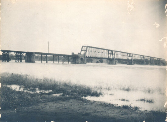 Burdekin River in flood at rail-bridge Macrossan