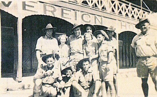 Soldiers and bar staff outside the Sovereign Hotel, 1942