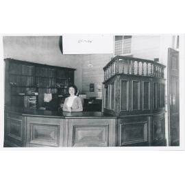 E D Miles & Co Mining Exchange Office, 65 Mosman Street- interior counter area and staff member