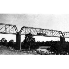 Large Picnic Party at the Burdekin River Showing Rail Bridge With Steam Train on Track