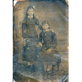 Two young girls in a studio portrait