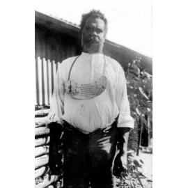 King Kiara Wearing a Brass Chest Plate