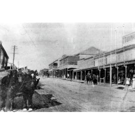 View on Gill Street looking towards Church Street intersection, Drummond & Co in foreground with Excelsior Hotel in centre of photo