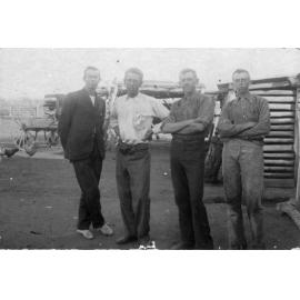 Four Men on Rural Station