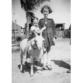 John Teasdale and Patricia Mangan with Noble the billygoat
