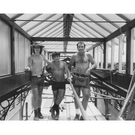 Glaziers at work inside the Stock Exchange Building restoration, 1975