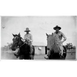 Larry Dalhunty and his father riding horses