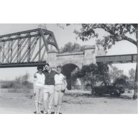Three people at the Macrossan Burdekin River Rail Bridge, 1959