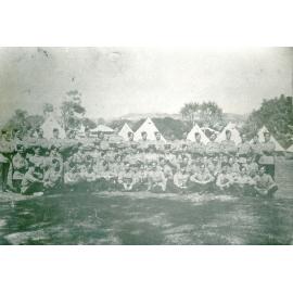 Large group of Military personnel in a camp