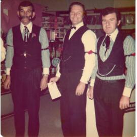 Staff Les Bagley, Rob Dixon and Colin Mitchell at Aridas store, dressed up for the Goldfields Festival 1979
