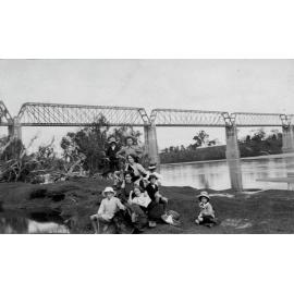 Group of women with children at Burdekin River, near the Macrossan rail bridge