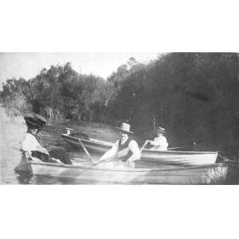 Three People Boating on the Burdekin River