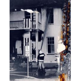 Fireman fighting fire at Police Station, Gill Street, 1988