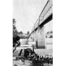 Picnickers under rail bridge at Macrossan, Burdekin River